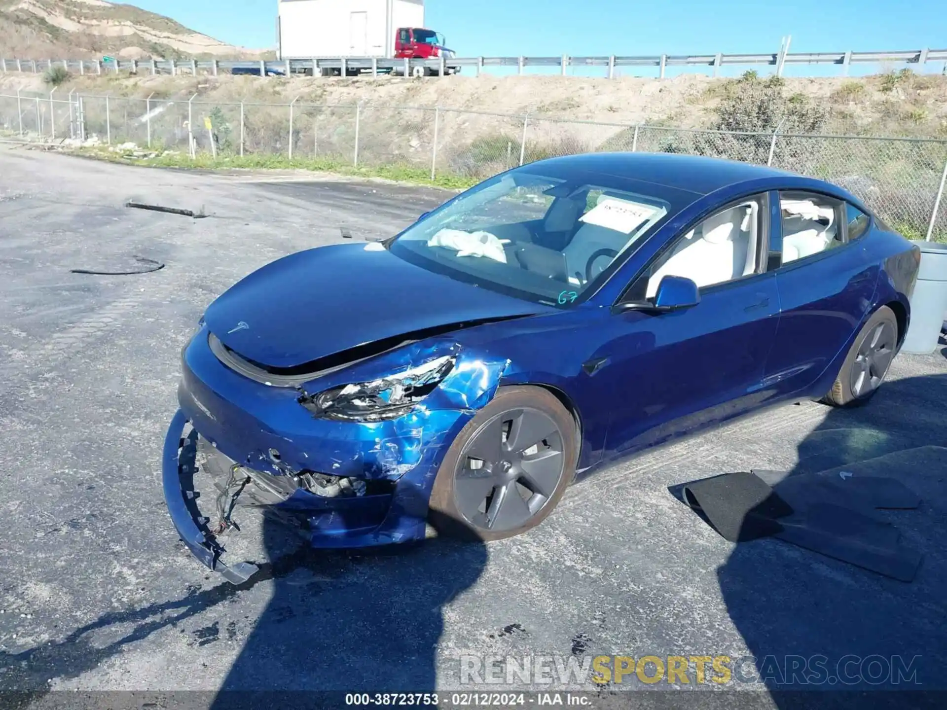 2 Photograph of a damaged car 5YJ3E1EA3NF373998 TESLA MODEL 3 2022