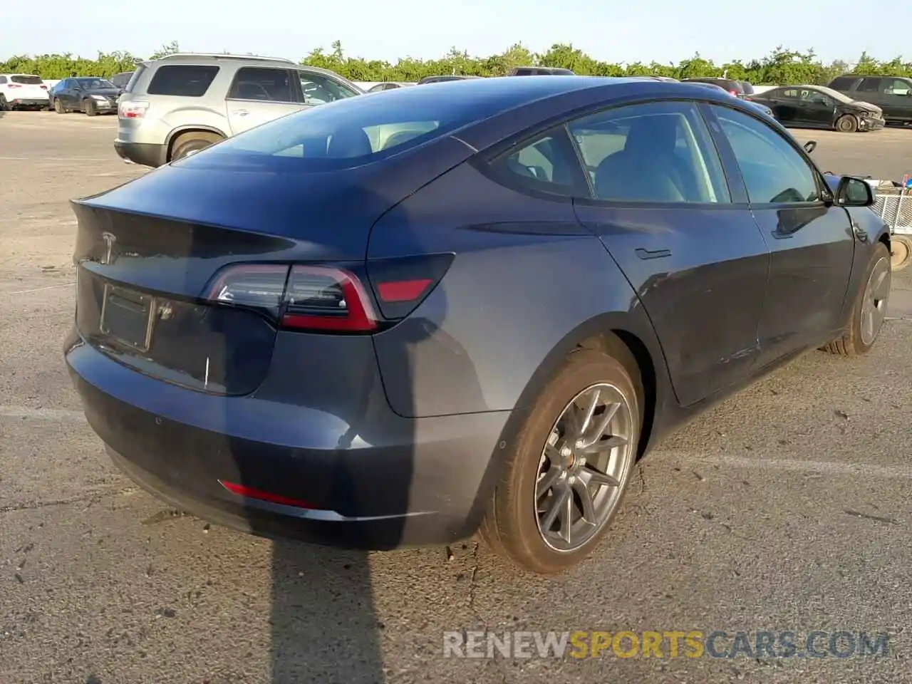 4 Photograph of a damaged car 5YJ3E1EA4NF101976 TESLA MODEL 3 2022