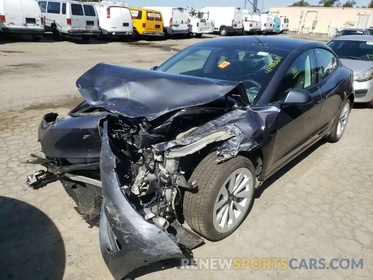 2 Photograph of a damaged car 5YJ3E1EA4NF143838 TESLA MODEL 3 2022