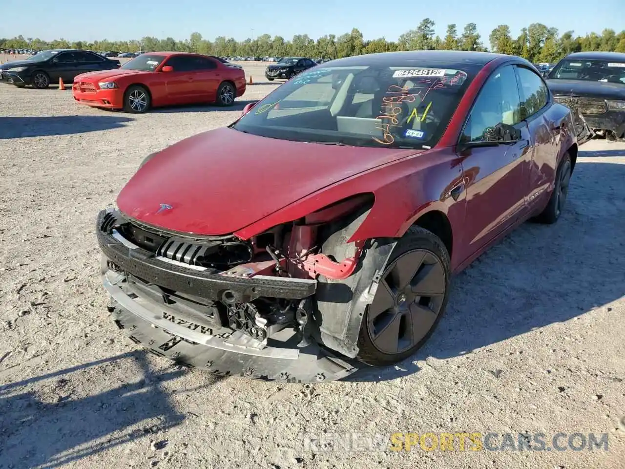 2 Photograph of a damaged car 5YJ3E1EA4NF185734 TESLA MODEL 3 2022