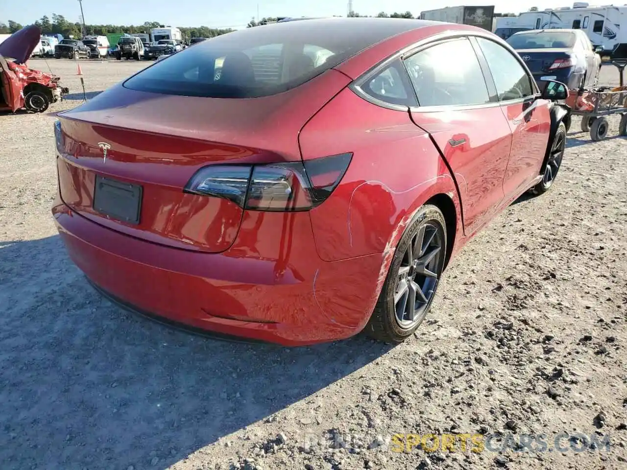 4 Photograph of a damaged car 5YJ3E1EA4NF185734 TESLA MODEL 3 2022