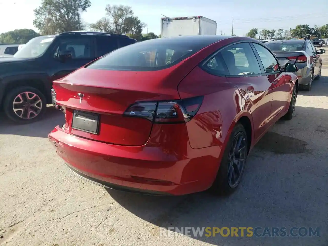 4 Photograph of a damaged car 5YJ3E1EA4NF186205 TESLA MODEL 3 2022