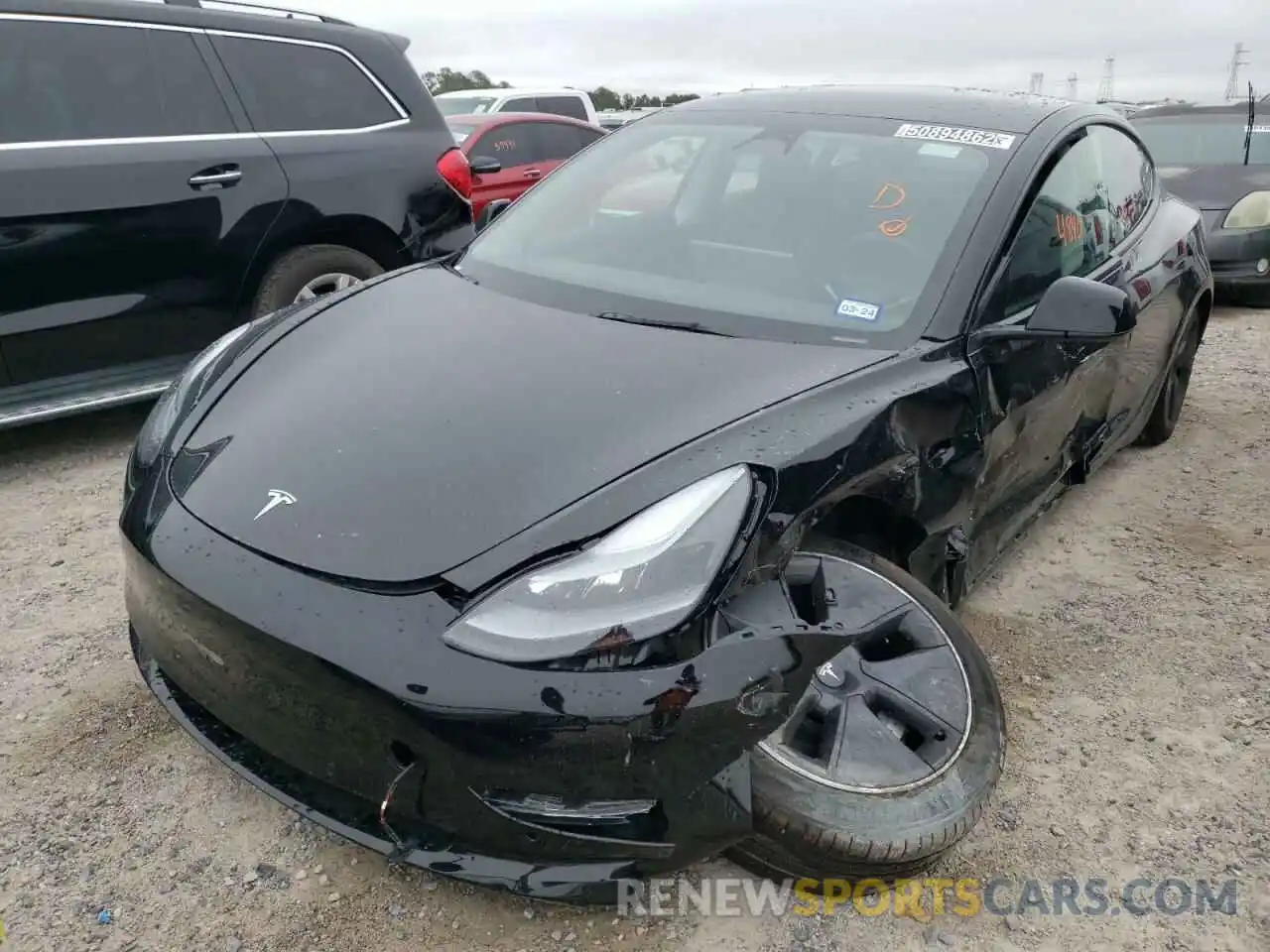 2 Photograph of a damaged car 5YJ3E1EA4NF186737 TESLA MODEL 3 2022