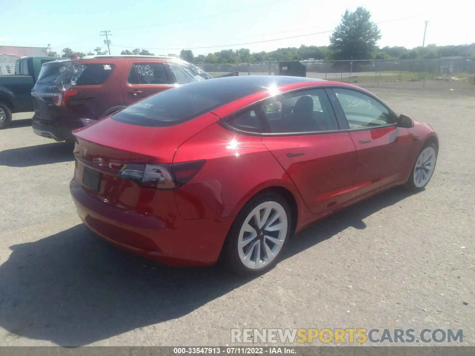 4 Photograph of a damaged car 5YJ3E1EA4NF186804 TESLA MODEL 3 2022