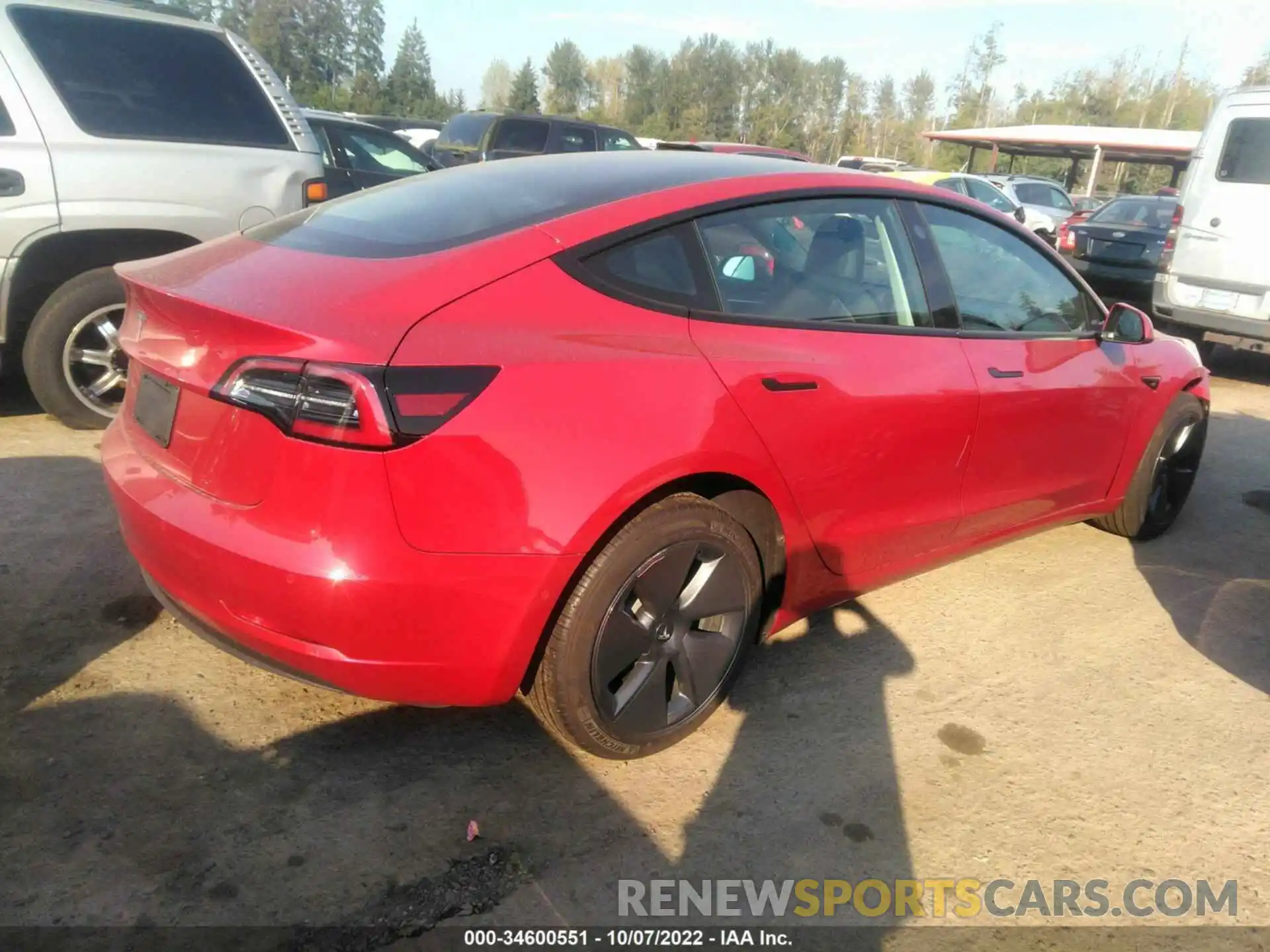 4 Photograph of a damaged car 5YJ3E1EA4NF201429 TESLA MODEL 3 2022