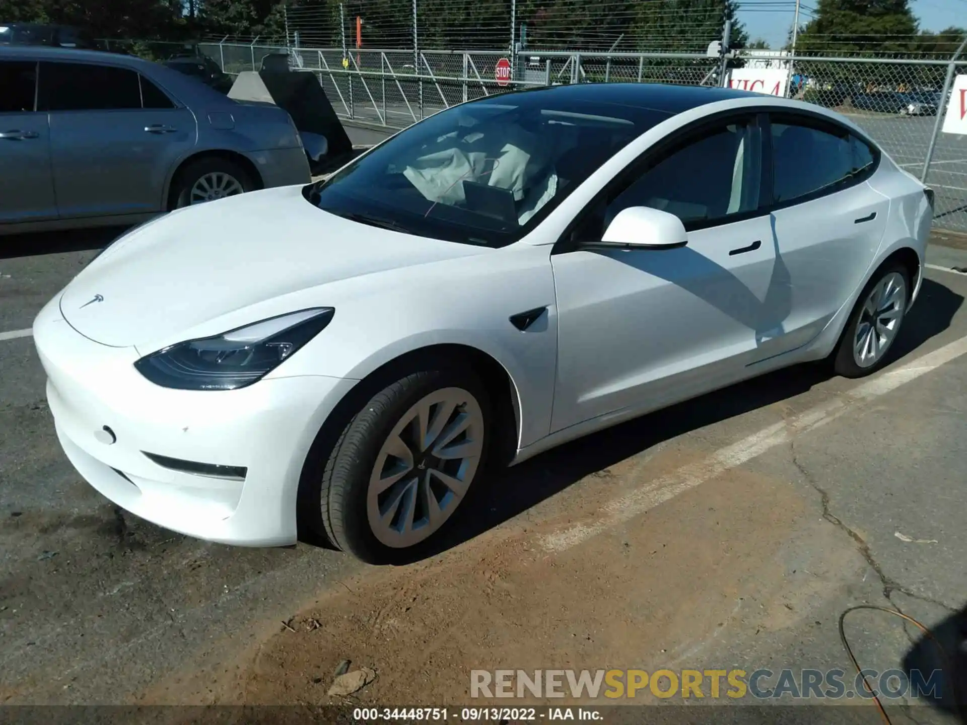 2 Photograph of a damaged car 5YJ3E1EA4NF239906 TESLA MODEL 3 2022