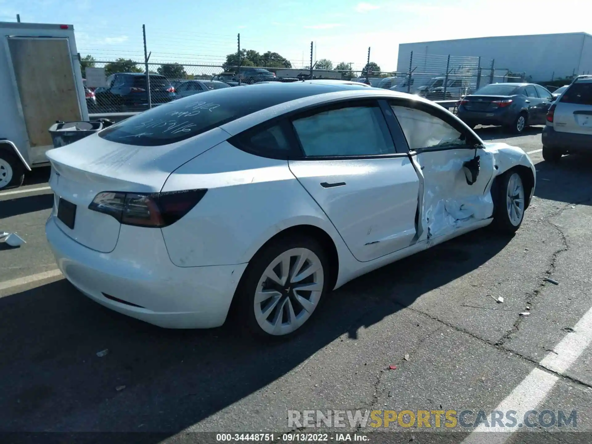 4 Photograph of a damaged car 5YJ3E1EA4NF239906 TESLA MODEL 3 2022