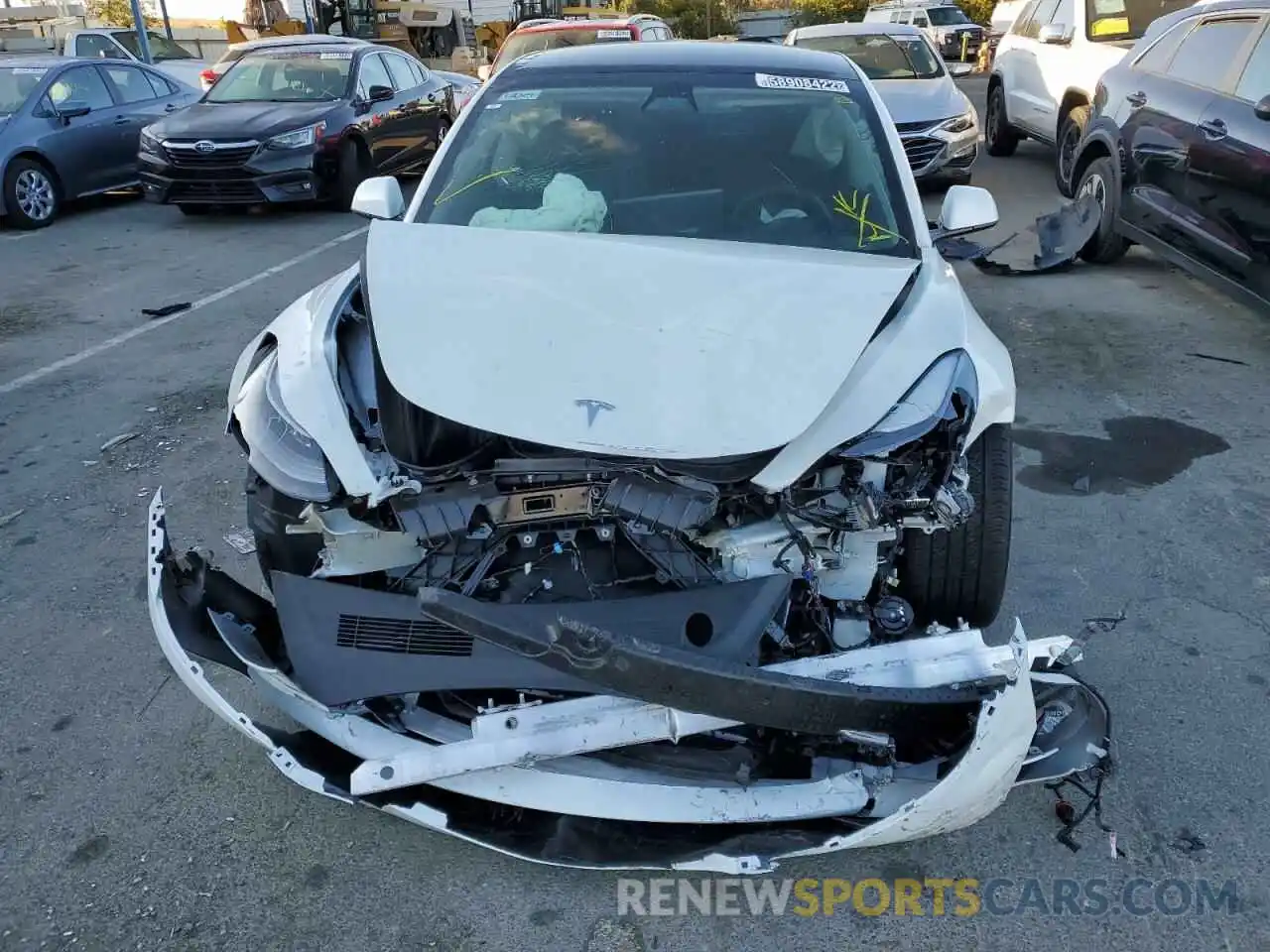 9 Photograph of a damaged car 5YJ3E1EA5NF143007 TESLA MODEL 3 2022