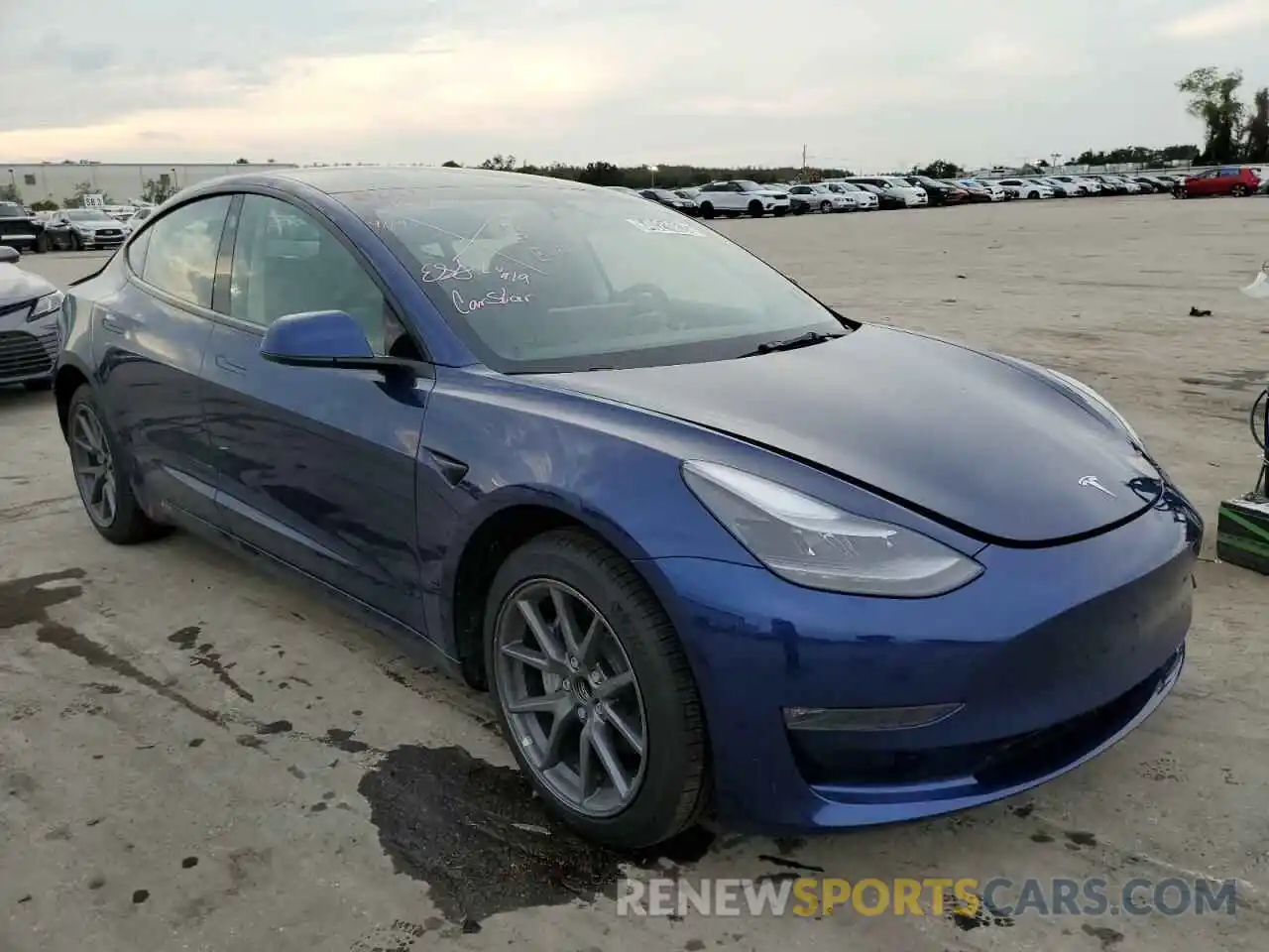 4 Photograph of a damaged car 5YJ3E1EA5NF188108 TESLA MODEL 3 2022