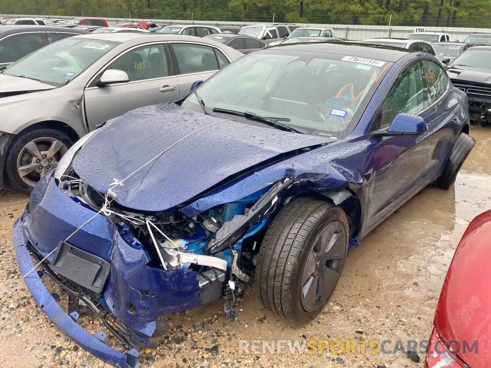 2 Photograph of a damaged car 5YJ3E1EA5NF188125 TESLA MODEL 3 2022