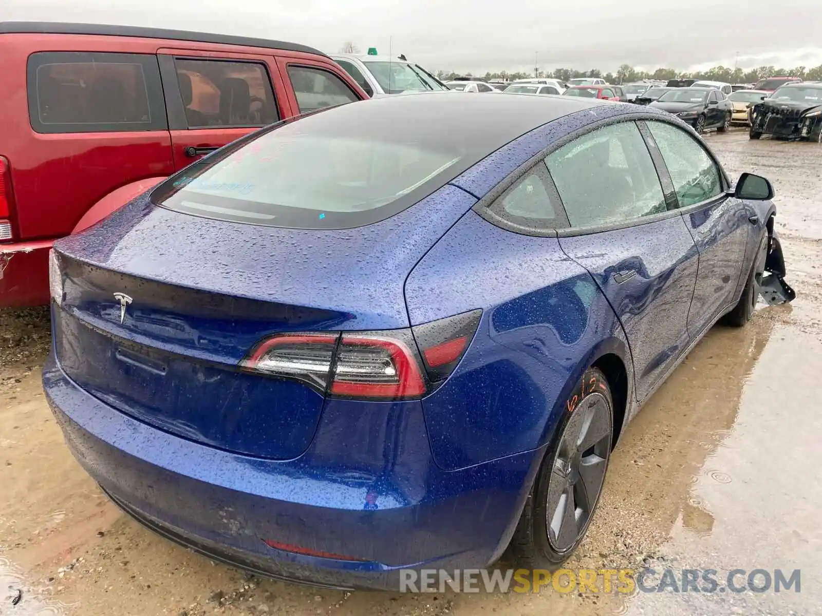 4 Photograph of a damaged car 5YJ3E1EA5NF188125 TESLA MODEL 3 2022