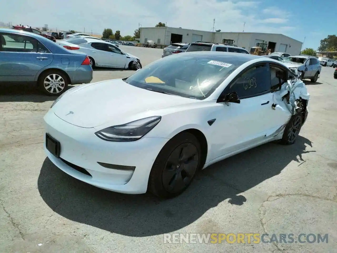 2 Photograph of a damaged car 5YJ3E1EA6NF122635 TESLA MODEL 3 2022