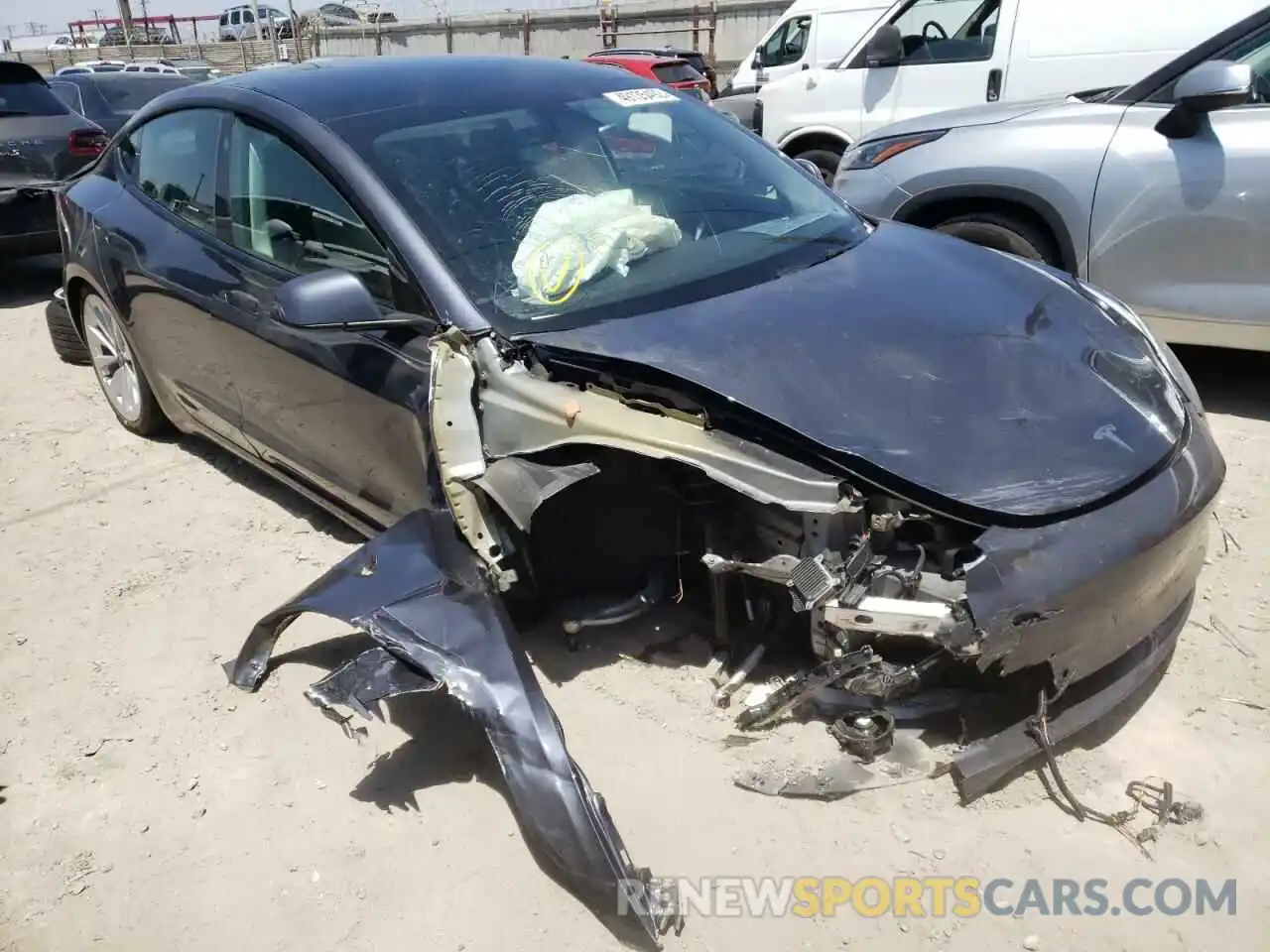 1 Photograph of a damaged car 5YJ3E1EA6NF143825 TESLA MODEL 3 2022