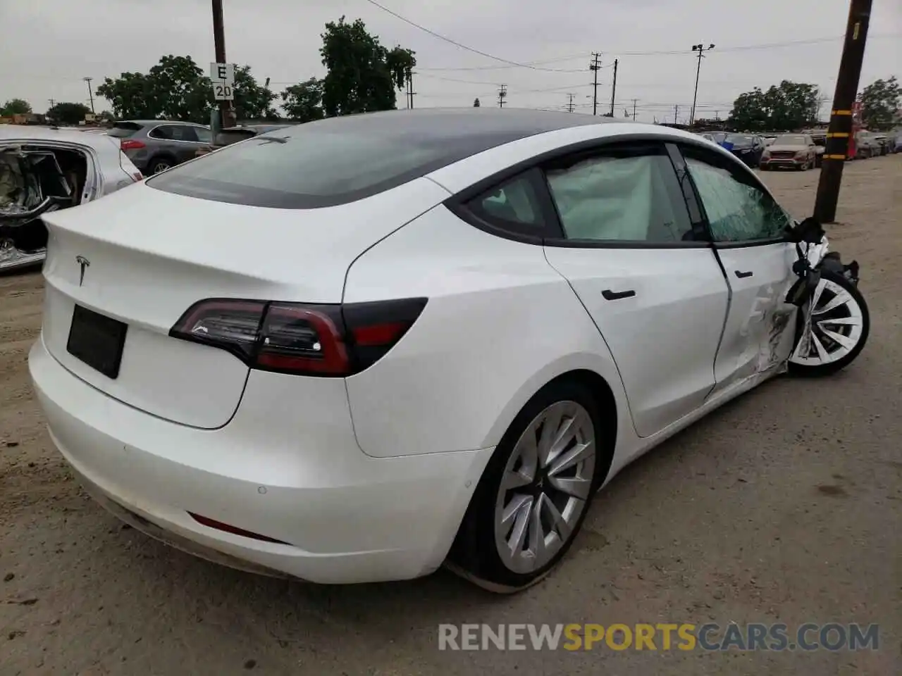 4 Photograph of a damaged car 5YJ3E1EA6NF143887 TESLA MODEL 3 2022