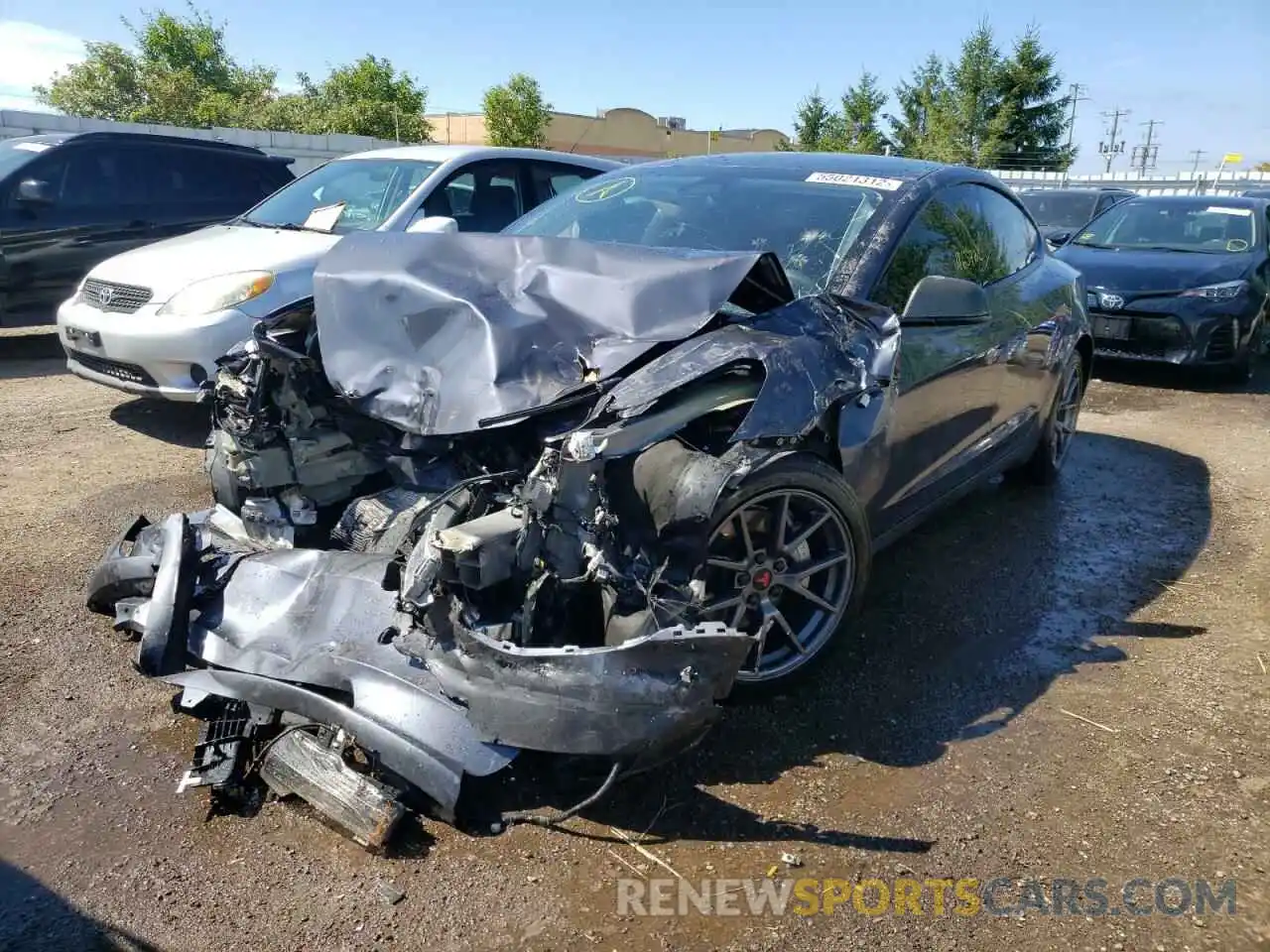 2 Photograph of a damaged car 5YJ3E1EA6NF158082 TESLA MODEL 3 2022