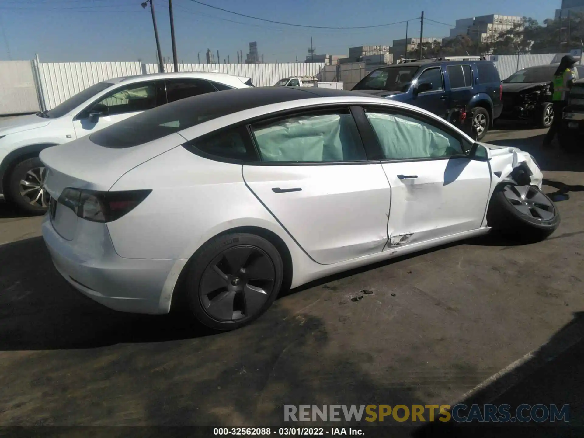 4 Photograph of a damaged car 5YJ3E1EA6NF169003 TESLA MODEL 3 2022