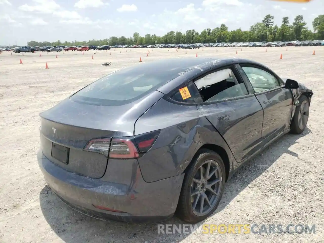 4 Photograph of a damaged car 5YJ3E1EA6NF186190 TESLA MODEL 3 2022