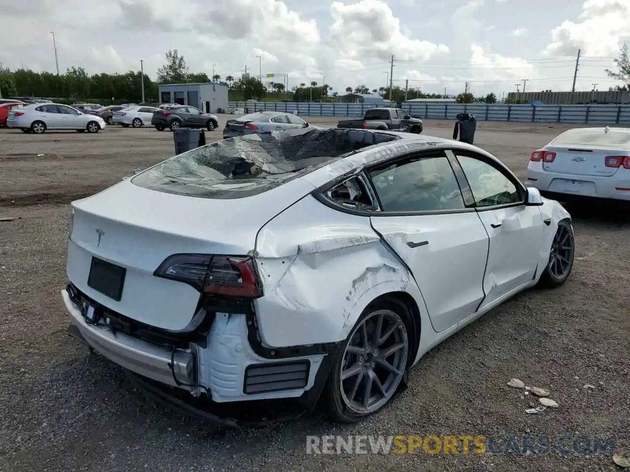 4 Photograph of a damaged car 5YJ3E1EA6NF188196 TESLA MODEL 3 2022