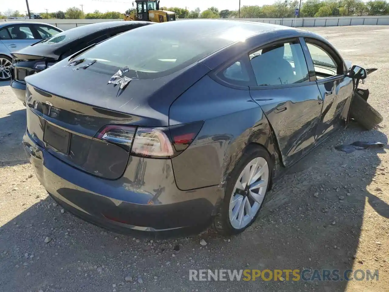 3 Photograph of a damaged car 5YJ3E1EA6NF188358 TESLA MODEL 3 2022