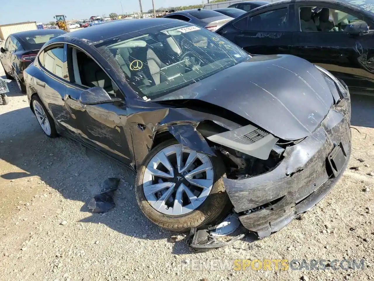 4 Photograph of a damaged car 5YJ3E1EA6NF188358 TESLA MODEL 3 2022