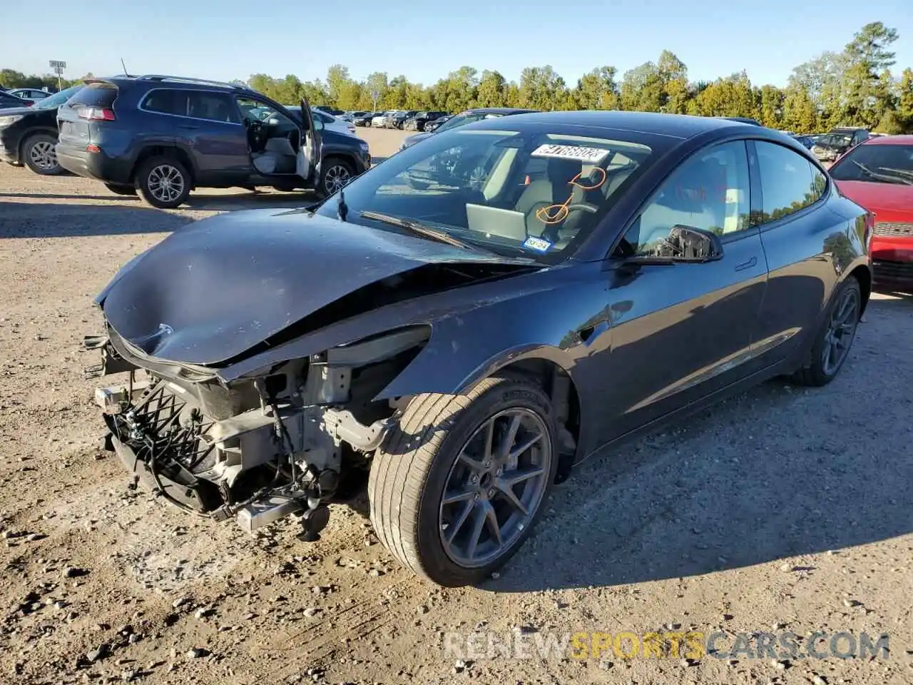 2 Photograph of a damaged car 5YJ3E1EA6NF189980 TESLA MODEL 3 2022