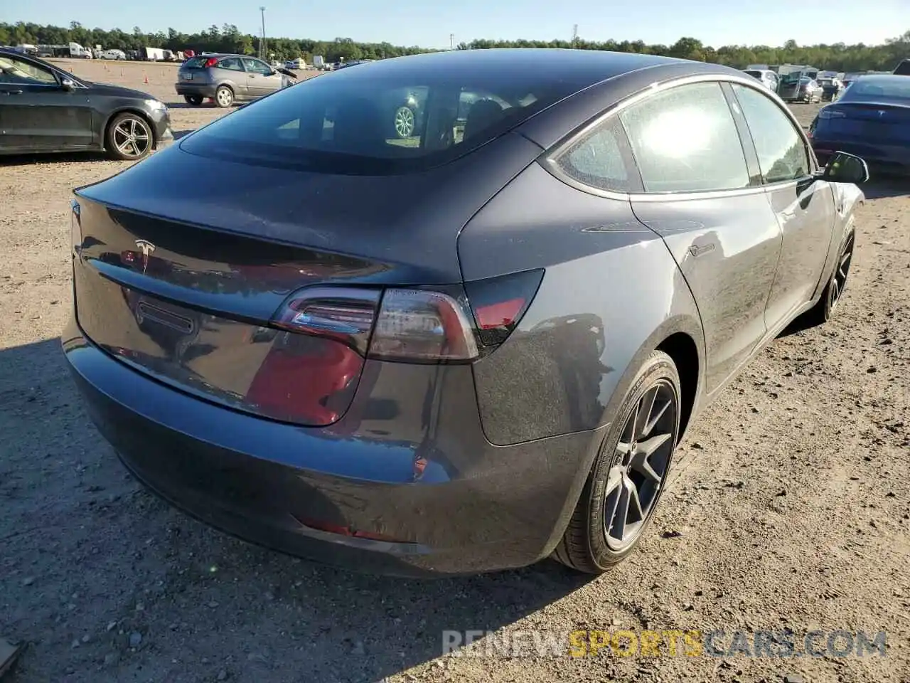 4 Photograph of a damaged car 5YJ3E1EA6NF189980 TESLA MODEL 3 2022