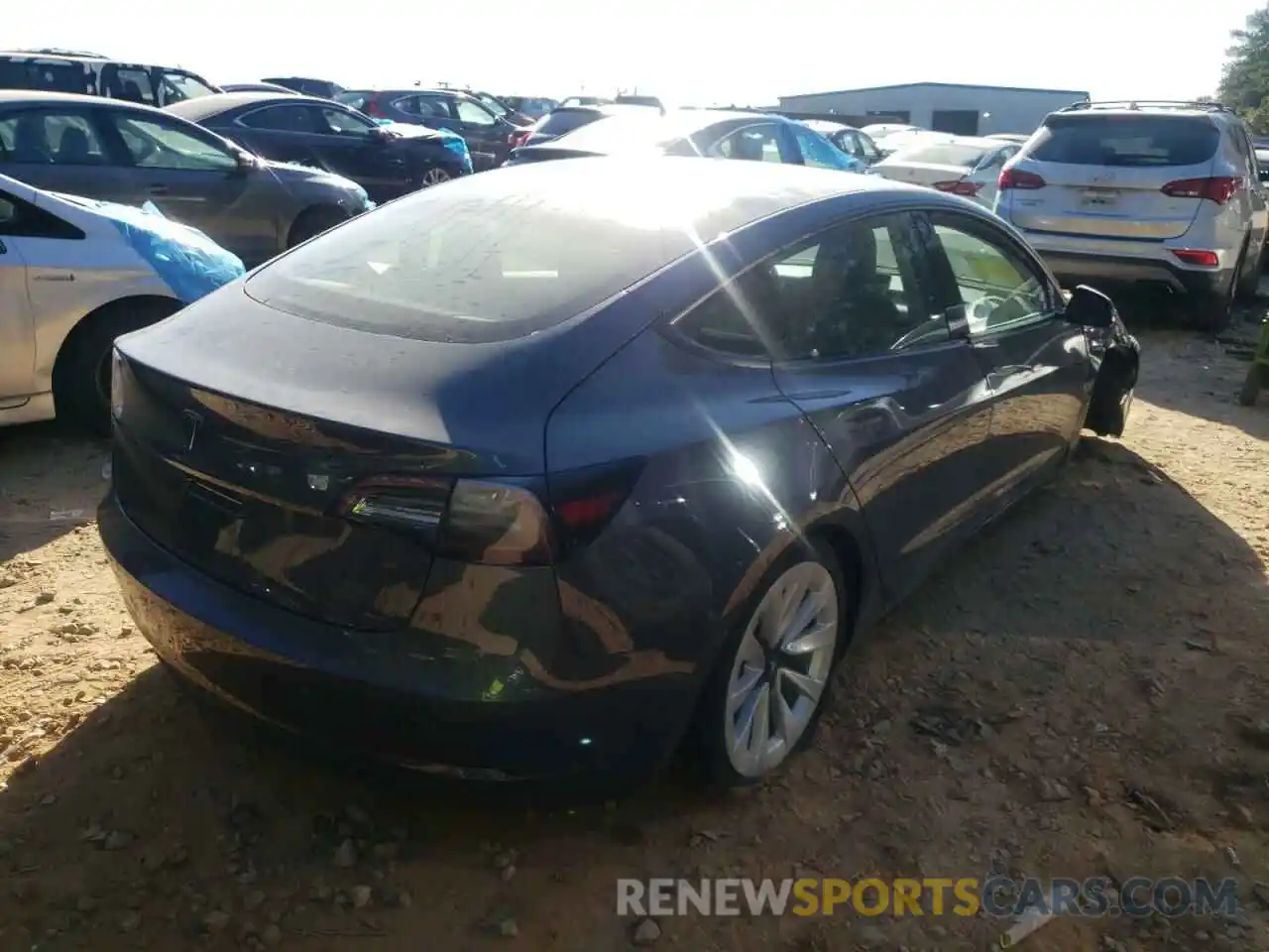 4 Photograph of a damaged car 5YJ3E1EA6NF285530 TESLA MODEL 3 2022