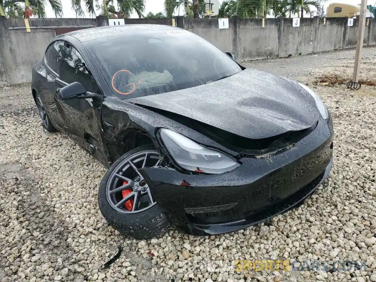 1 Photograph of a damaged car 5YJ3E1EA6NF317652 TESLA MODEL 3 2022