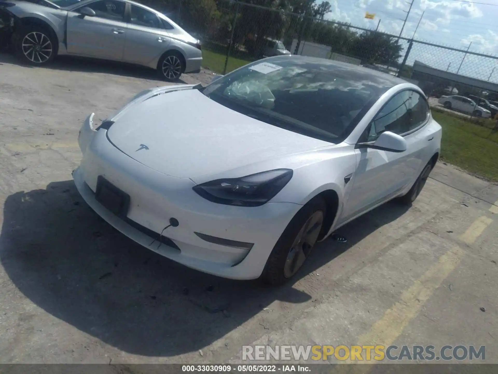 2 Photograph of a damaged car 5YJ3E1EA7NF103771 TESLA MODEL 3 2022