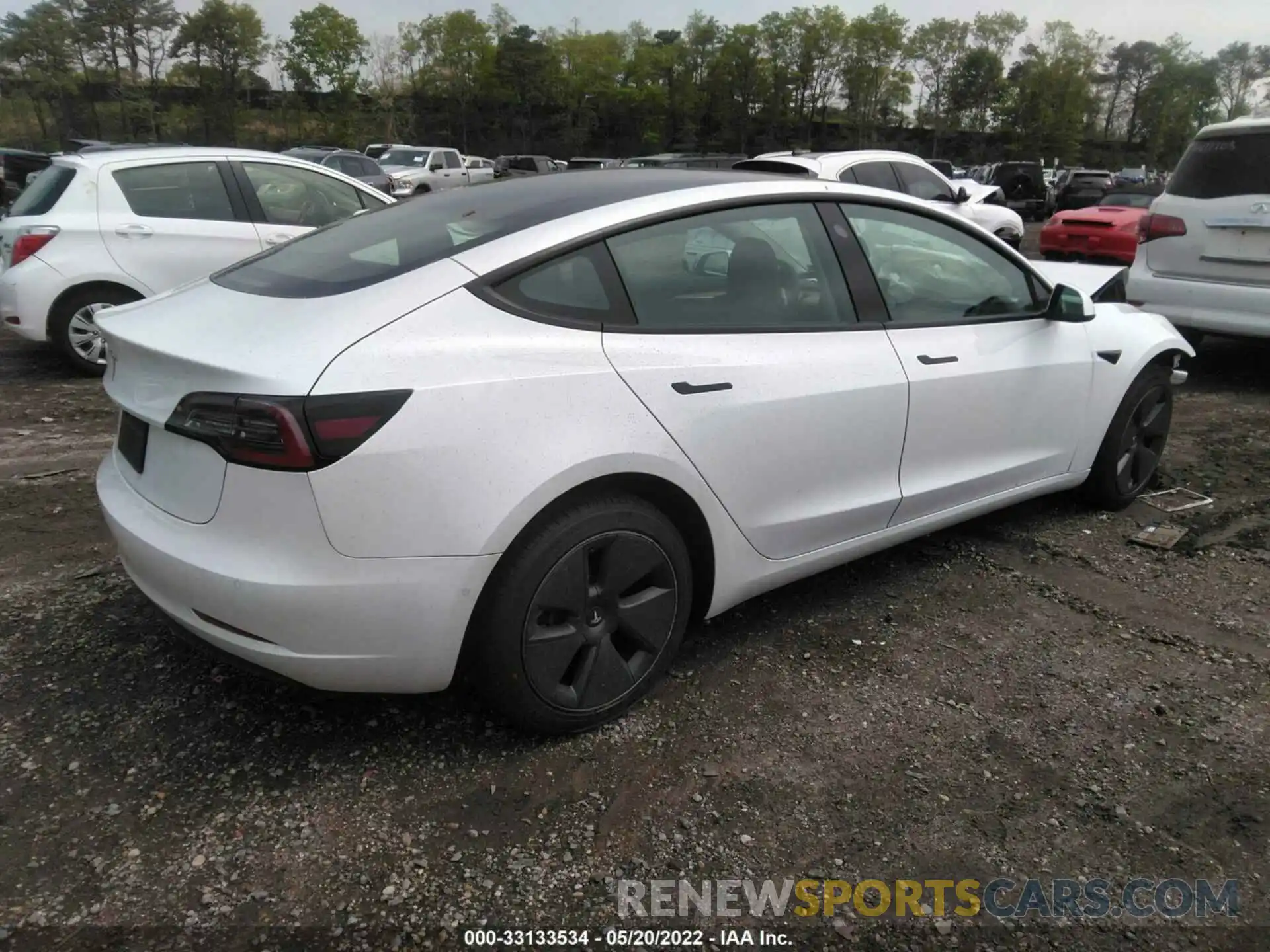 4 Photograph of a damaged car 5YJ3E1EA7NF112079 TESLA MODEL 3 2022