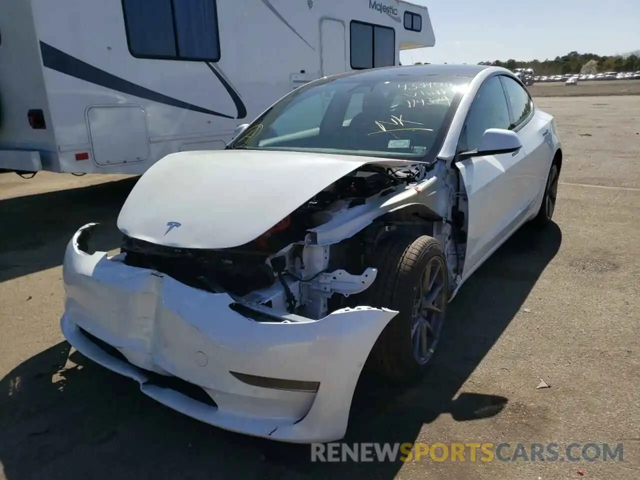 2 Photograph of a damaged car 5YJ3E1EA7NF114379 TESLA MODEL 3 2022