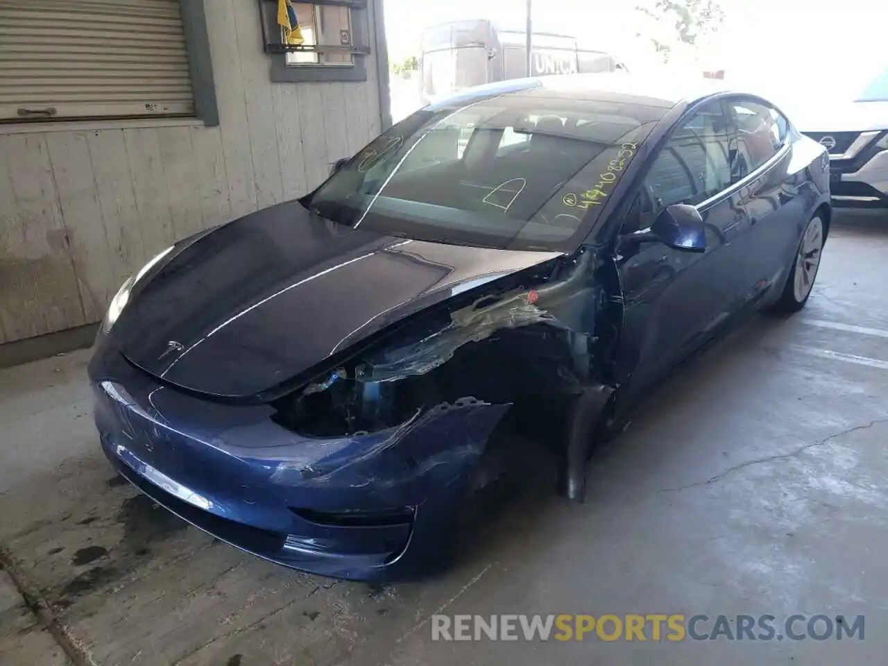 2 Photograph of a damaged car 5YJ3E1EA7NF142957 TESLA MODEL 3 2022