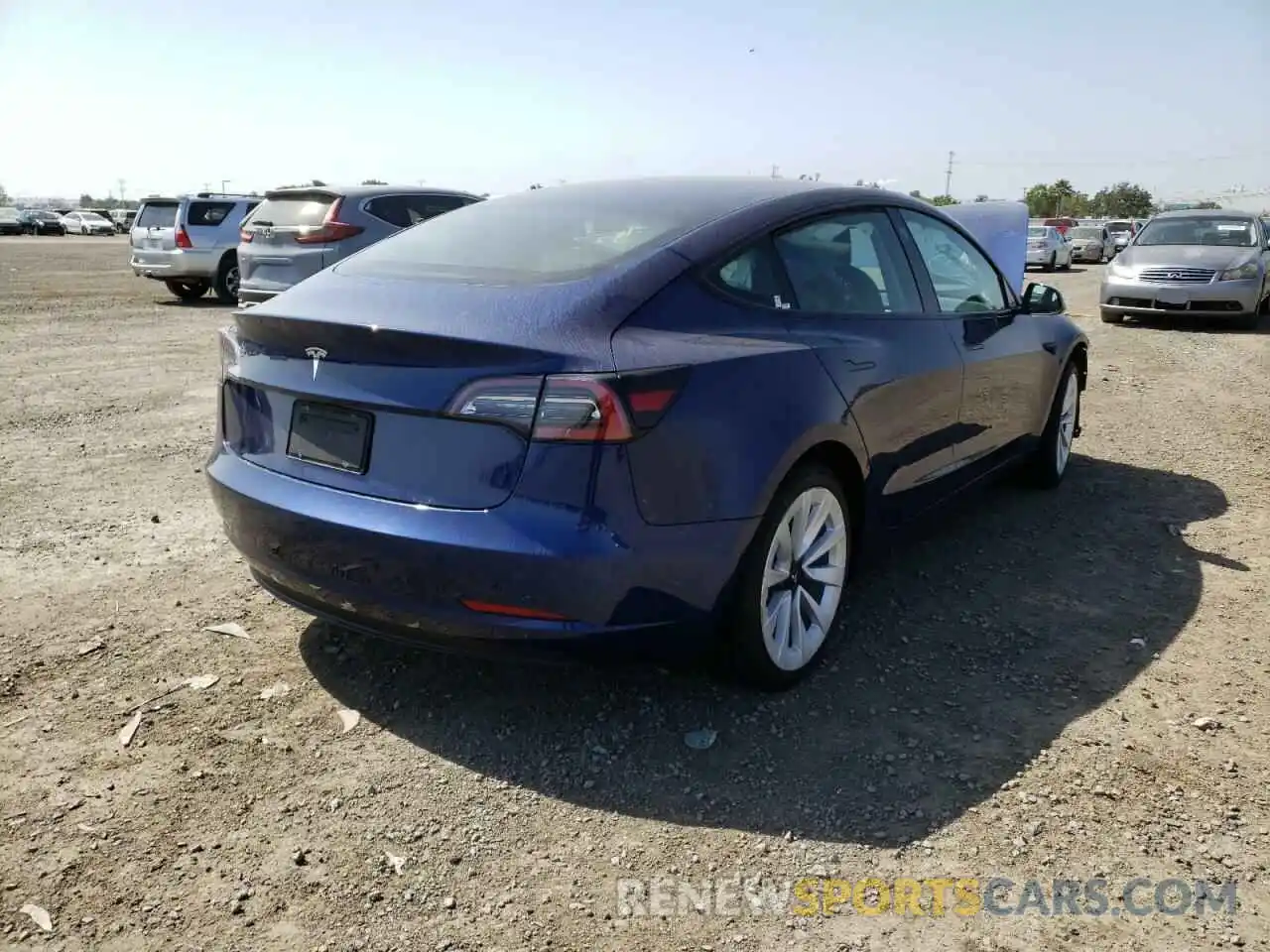 4 Photograph of a damaged car 5YJ3E1EA7NF143476 TESLA MODEL 3 2022