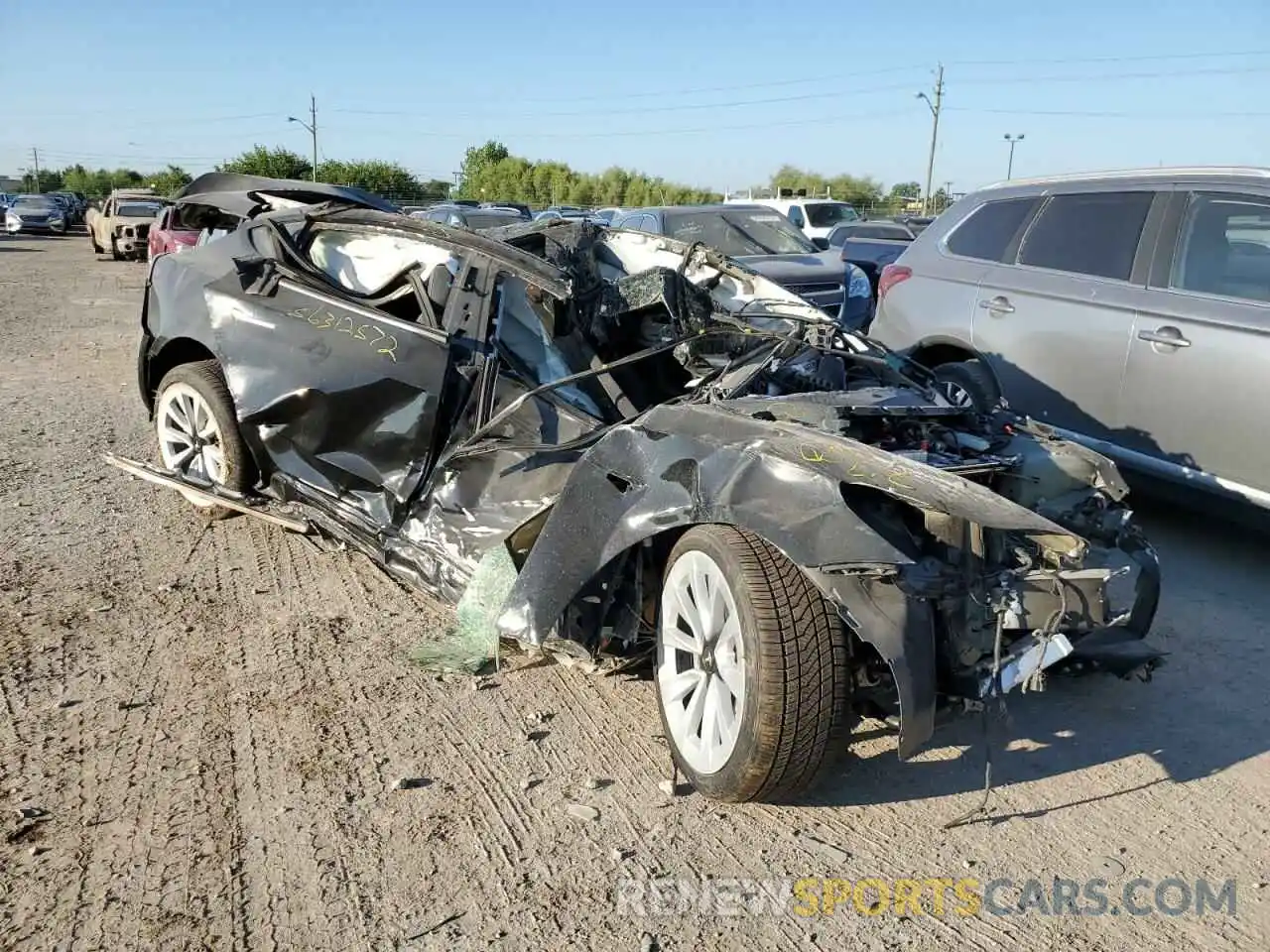 1 Photograph of a damaged car 5YJ3E1EA7NF184853 TESLA MODEL 3 2022