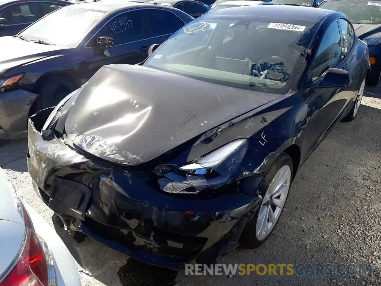 2 Photograph of a damaged car 5YJ3E1EA7NF285794 TESLA MODEL 3 2022