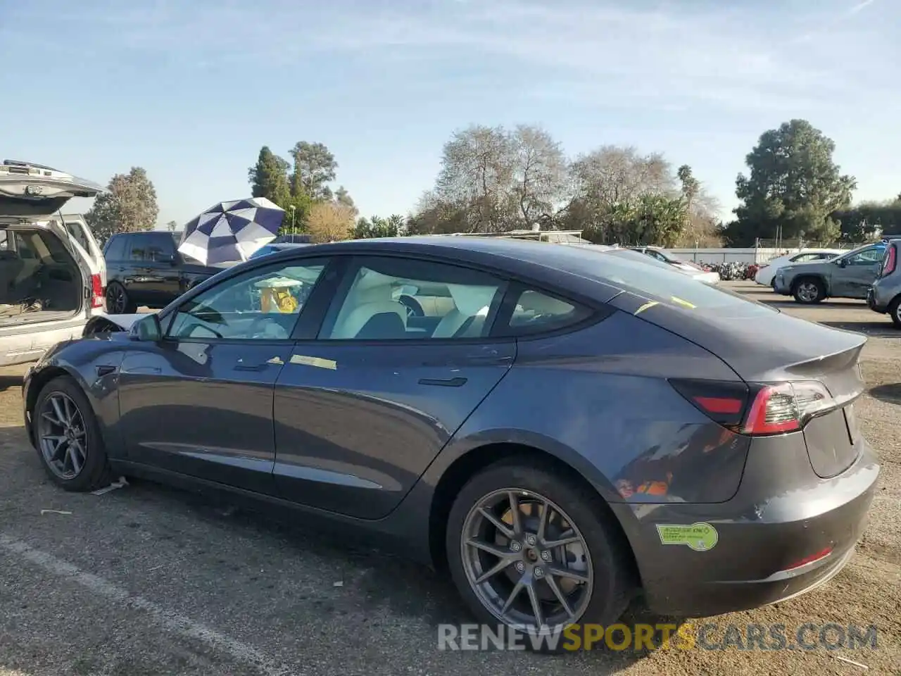 2 Photograph of a damaged car 5YJ3E1EA7NF322150 TESLA MODEL 3 2022