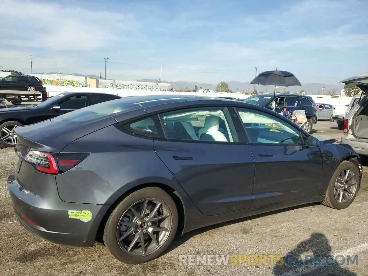 3 Photograph of a damaged car 5YJ3E1EA7NF322150 TESLA MODEL 3 2022