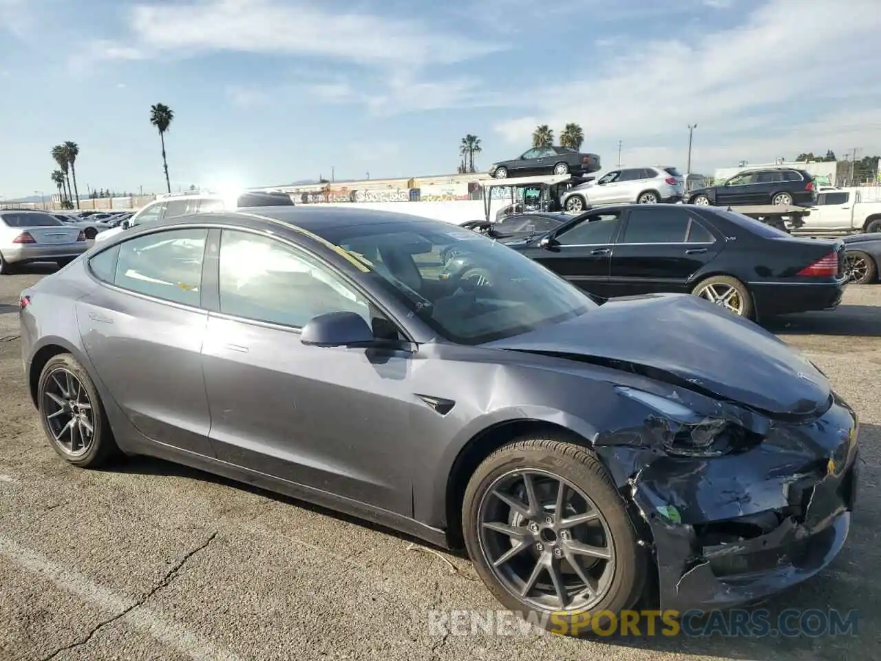 4 Photograph of a damaged car 5YJ3E1EA7NF322150 TESLA MODEL 3 2022