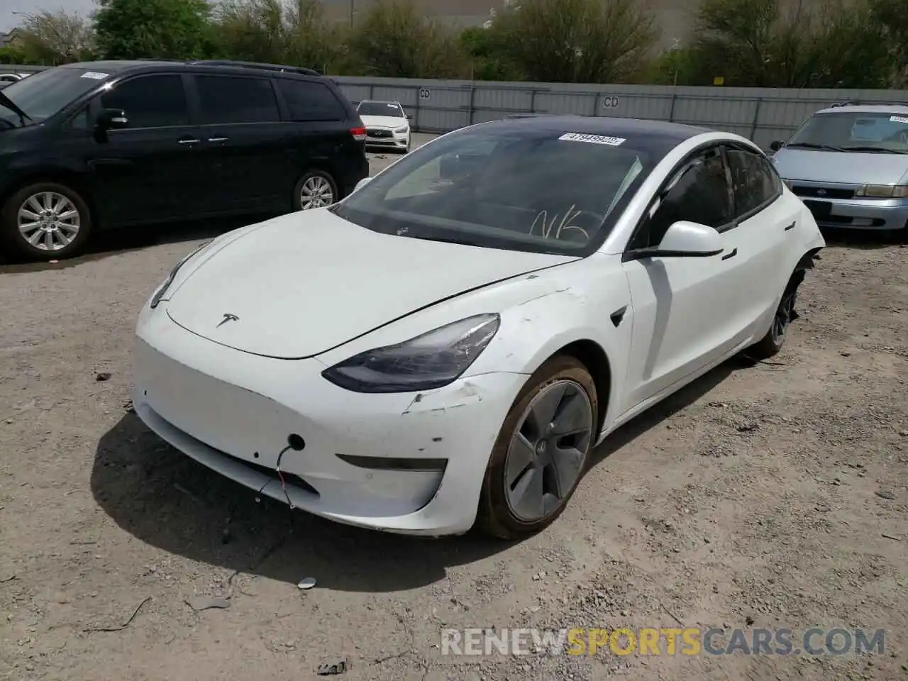 2 Photograph of a damaged car 5YJ3E1EA8NF112236 TESLA MODEL 3 2022