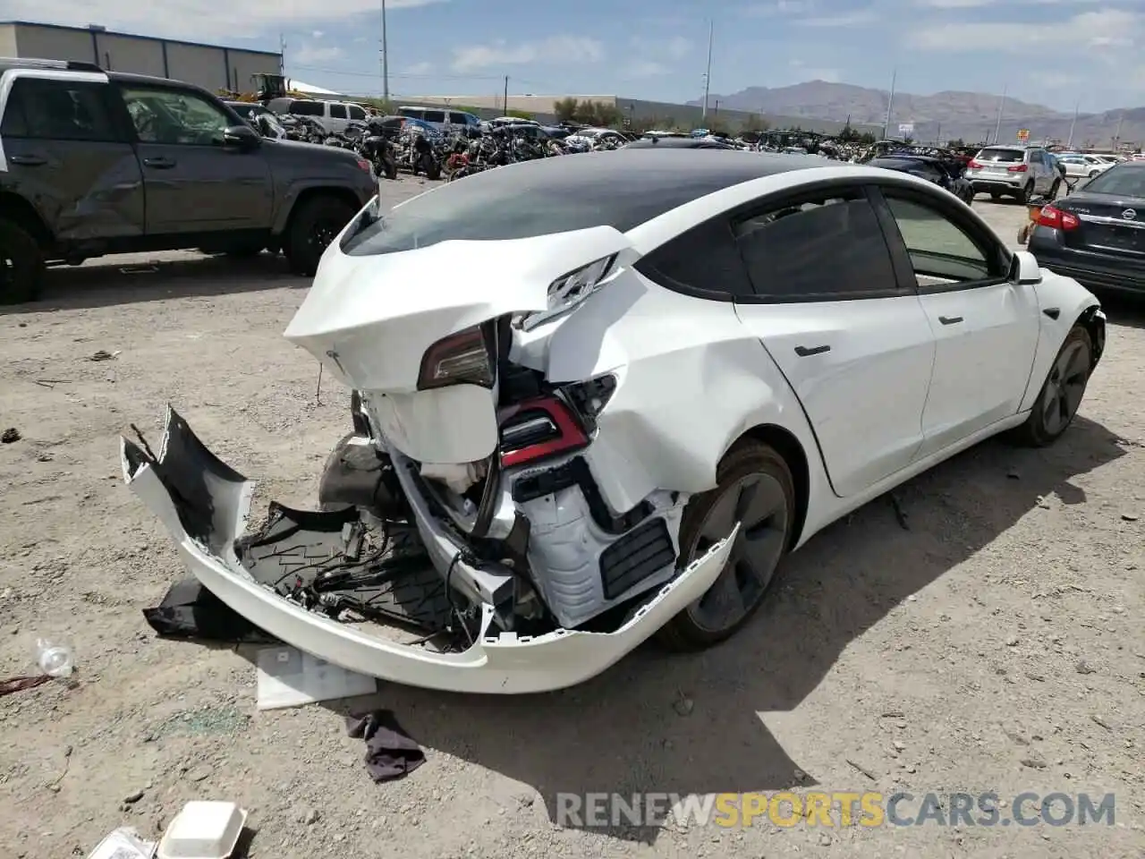 4 Photograph of a damaged car 5YJ3E1EA8NF112236 TESLA MODEL 3 2022