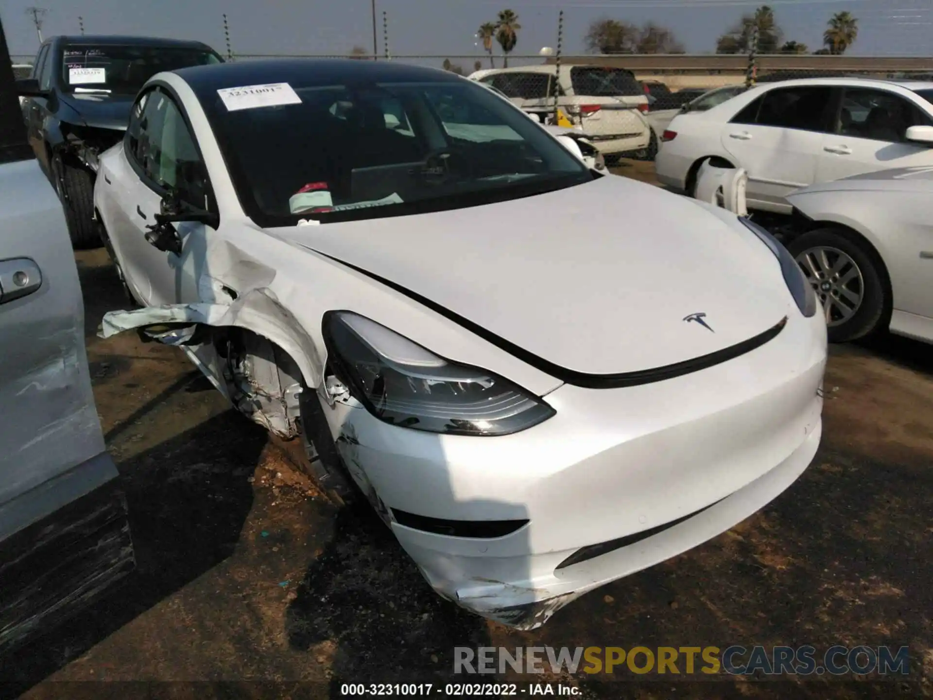 1 Photograph of a damaged car 5YJ3E1EA8NF122863 TESLA MODEL 3 2022