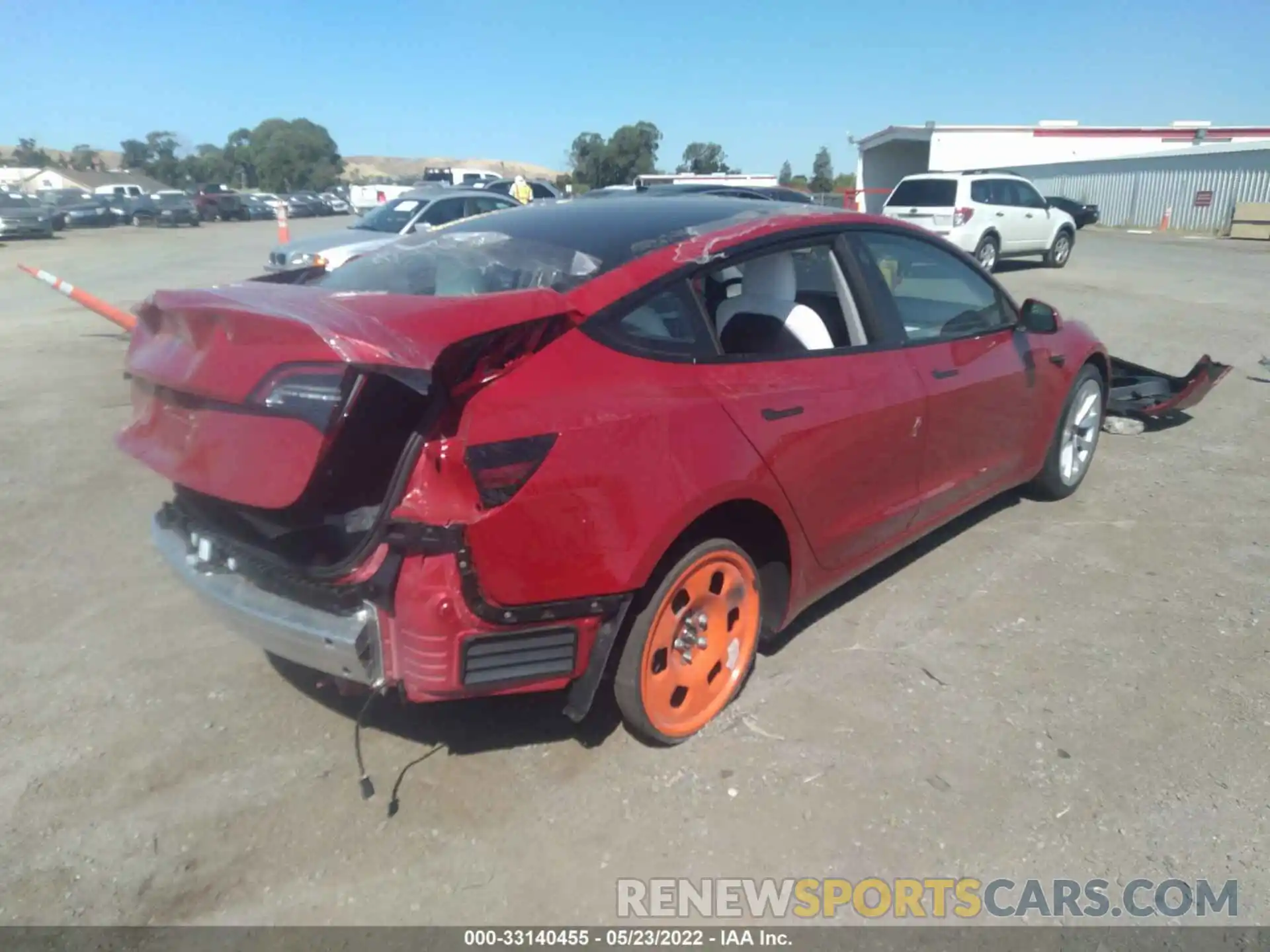 4 Photograph of a damaged car 5YJ3E1EA8NF131577 TESLA MODEL 3 2022