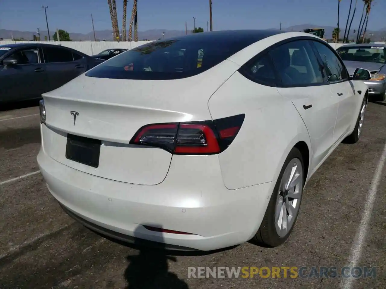 4 Photograph of a damaged car 5YJ3E1EA8NF143017 TESLA MODEL 3 2022