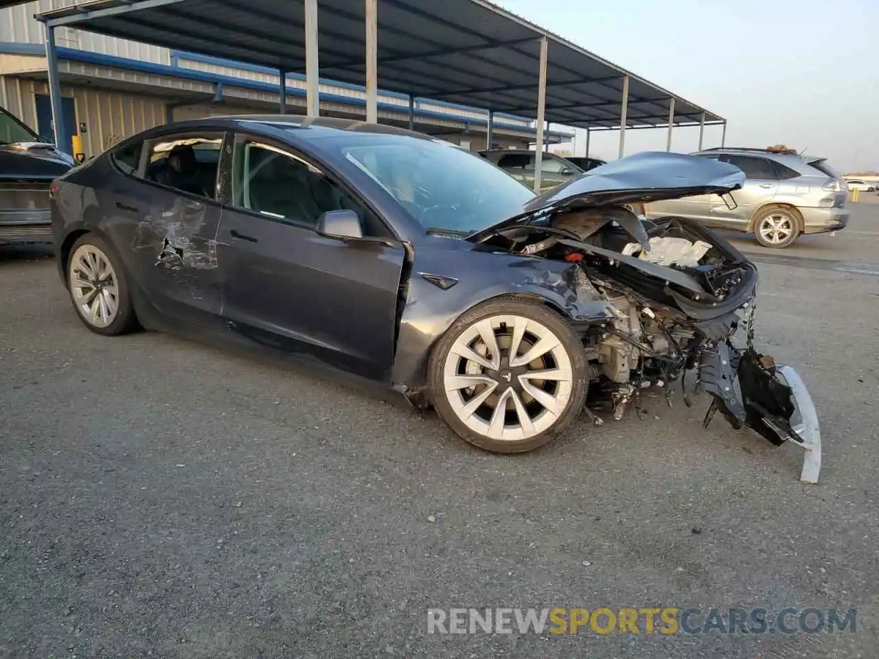 4 Photograph of a damaged car 5YJ3E1EA8NF144930 TESLA MODEL 3 2022