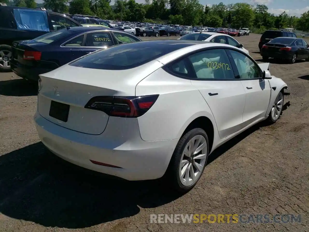 4 Photograph of a damaged car 5YJ3E1EA8NF154387 TESLA MODEL 3 2022