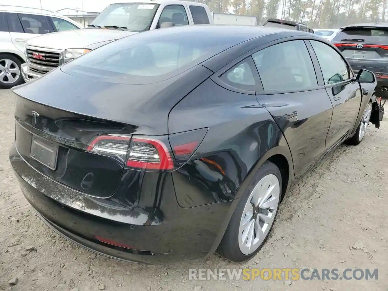 4 Photograph of a damaged car 5YJ3E1EA8NF188278 TESLA MODEL 3 2022