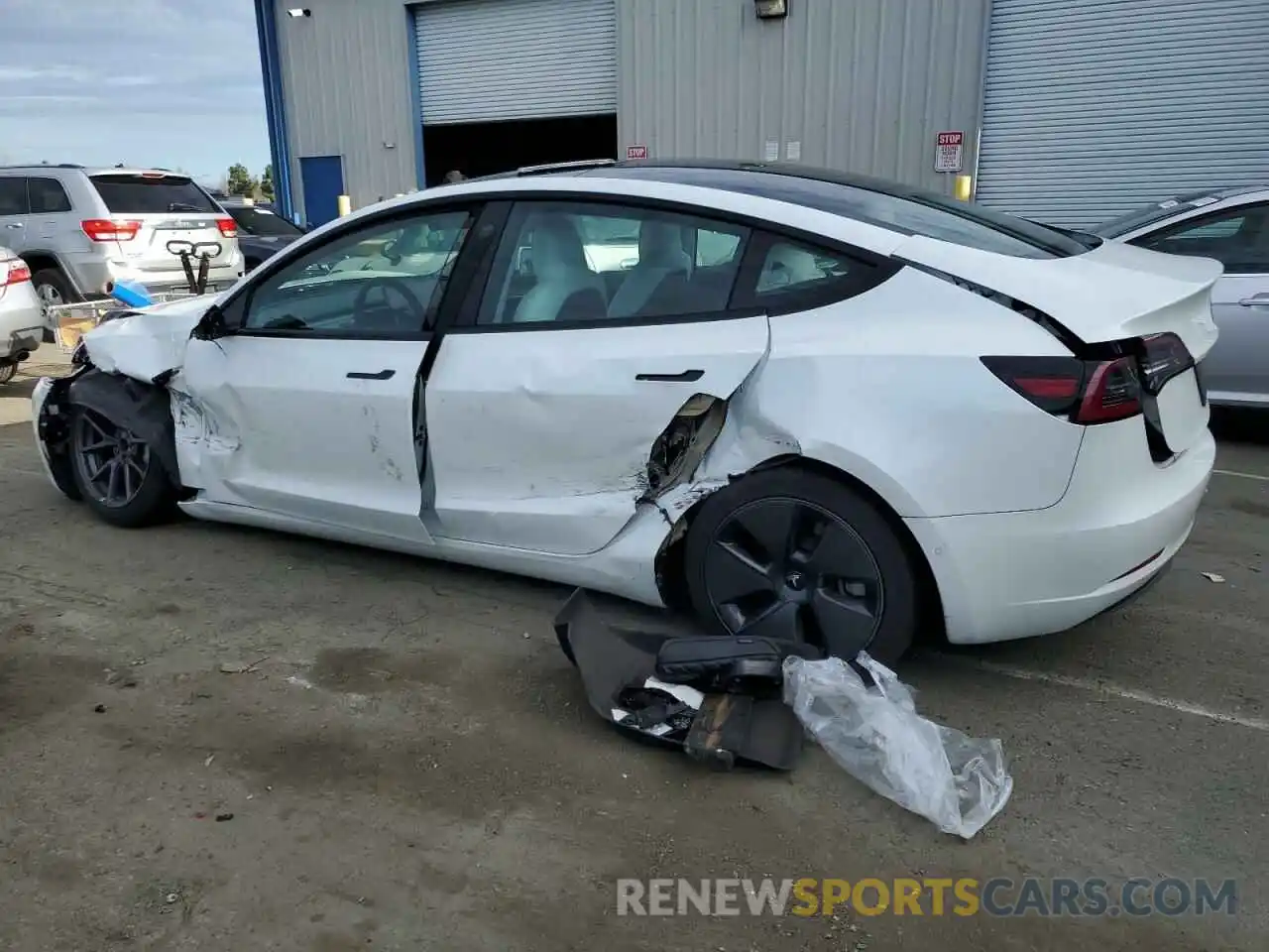 2 Photograph of a damaged car 5YJ3E1EA9NF106803 TESLA MODEL 3 2022