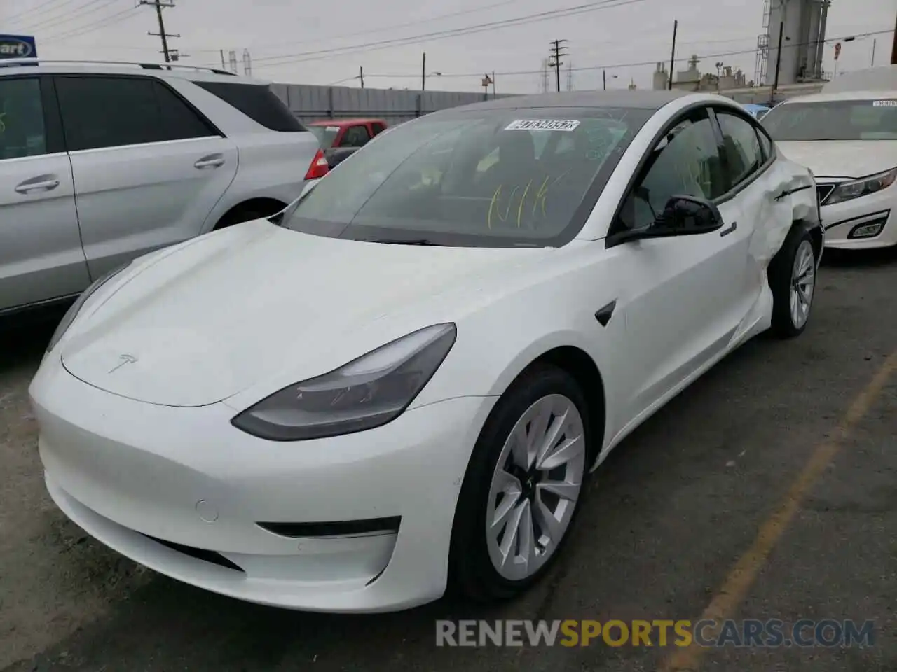 2 Photograph of a damaged car 5YJ3E1EA9NF143849 TESLA MODEL 3 2022