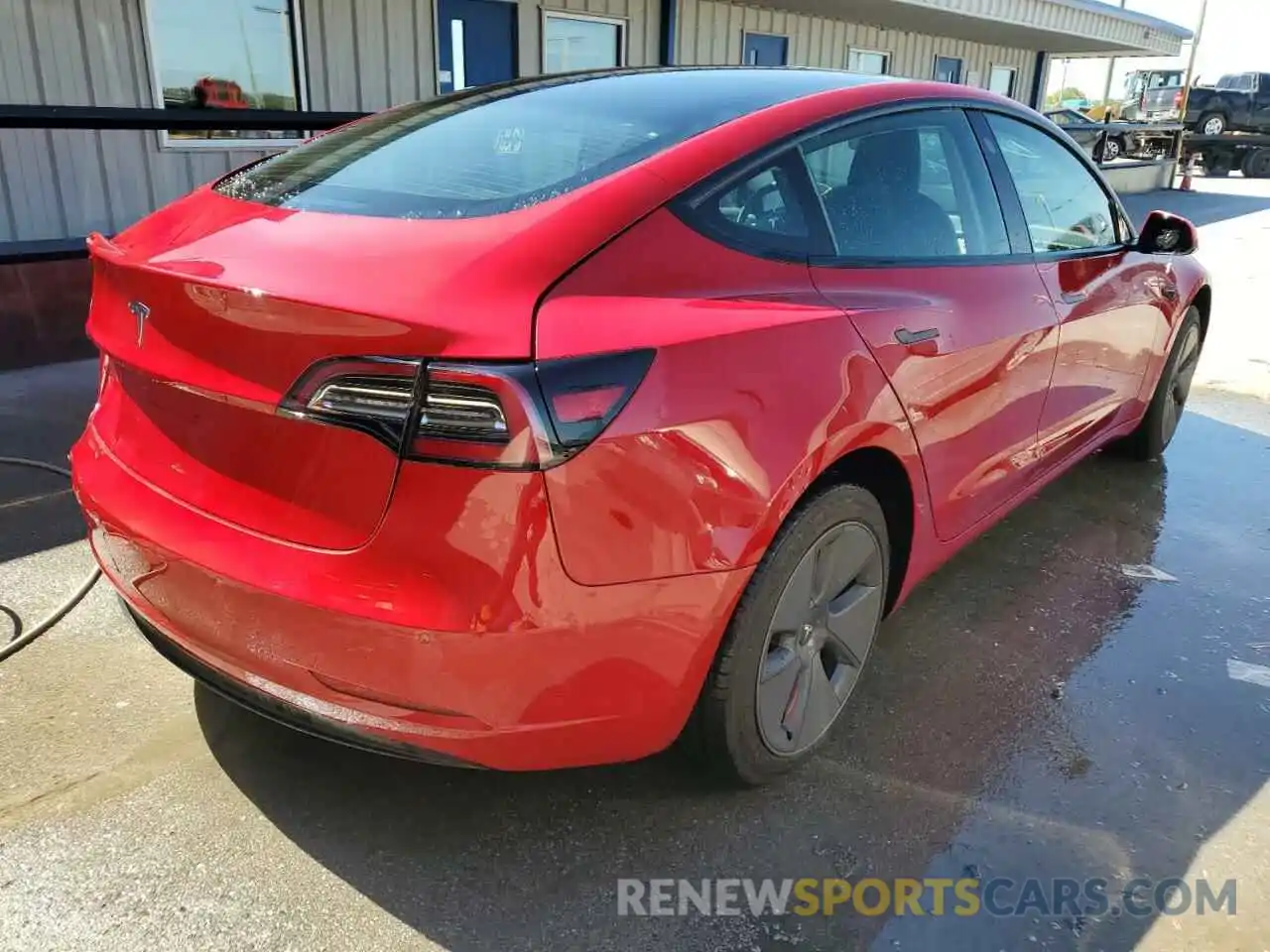 4 Photograph of a damaged car 5YJ3E1EA9NF185261 TESLA MODEL 3 2022