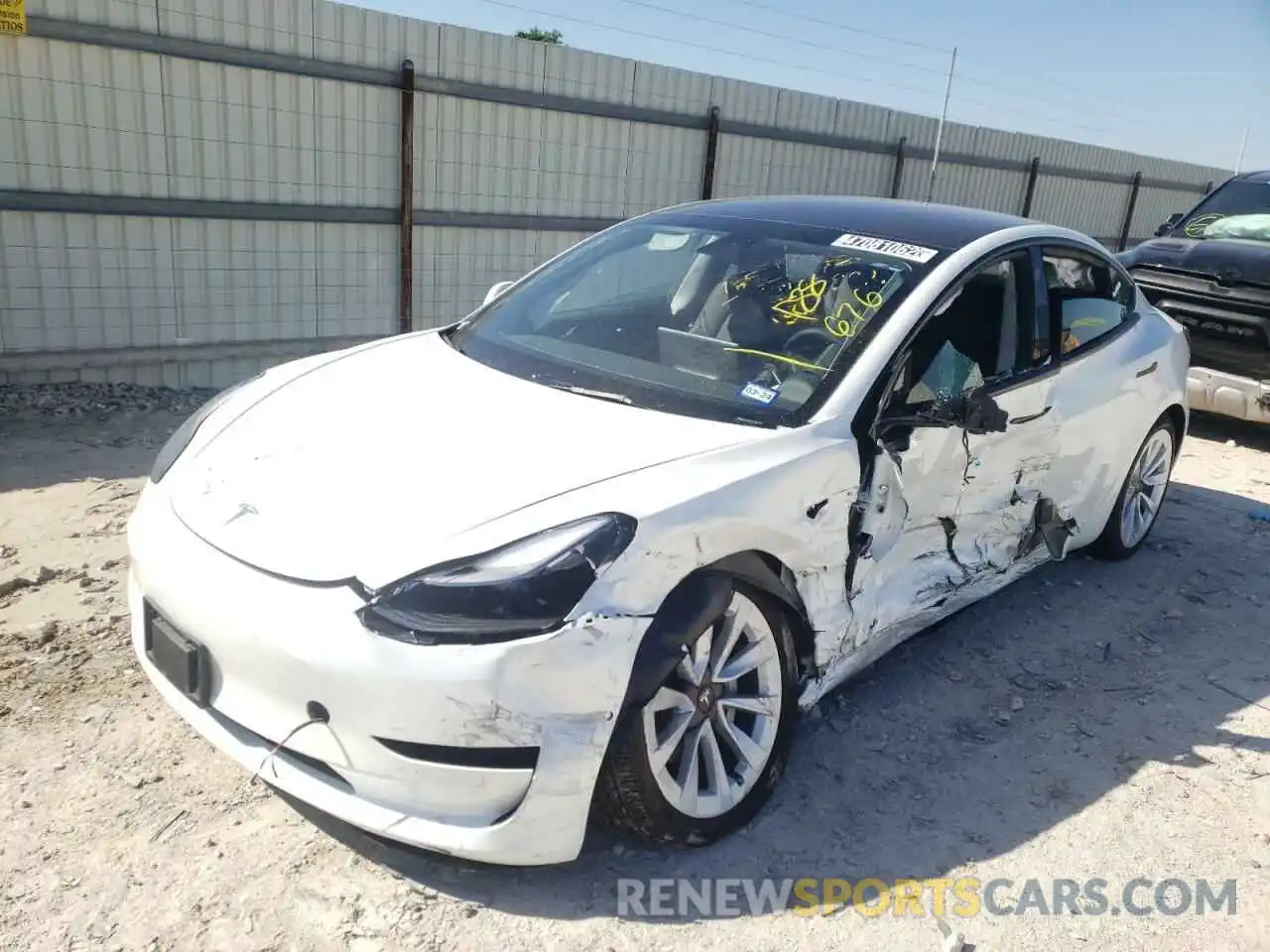 2 Photograph of a damaged car 5YJ3E1EA9NF188676 TESLA MODEL 3 2022